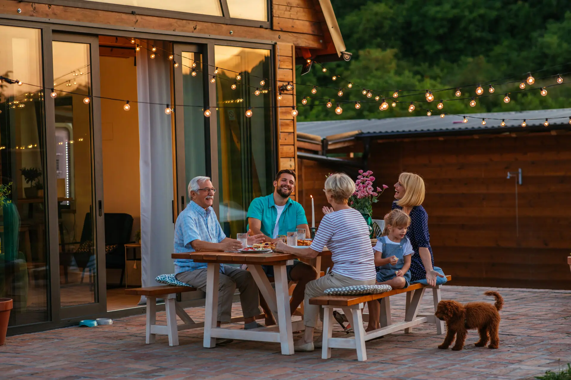 Family having dinner alfresco while on holiday