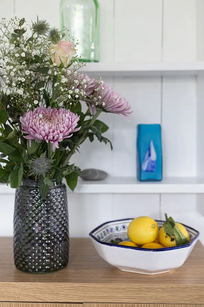 Flowers and fruit bowl