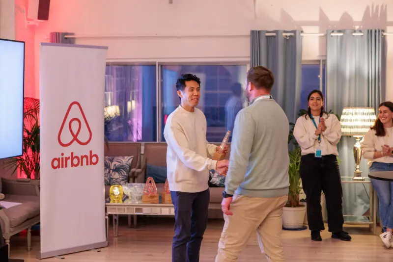 Josh accepting Airbnb award