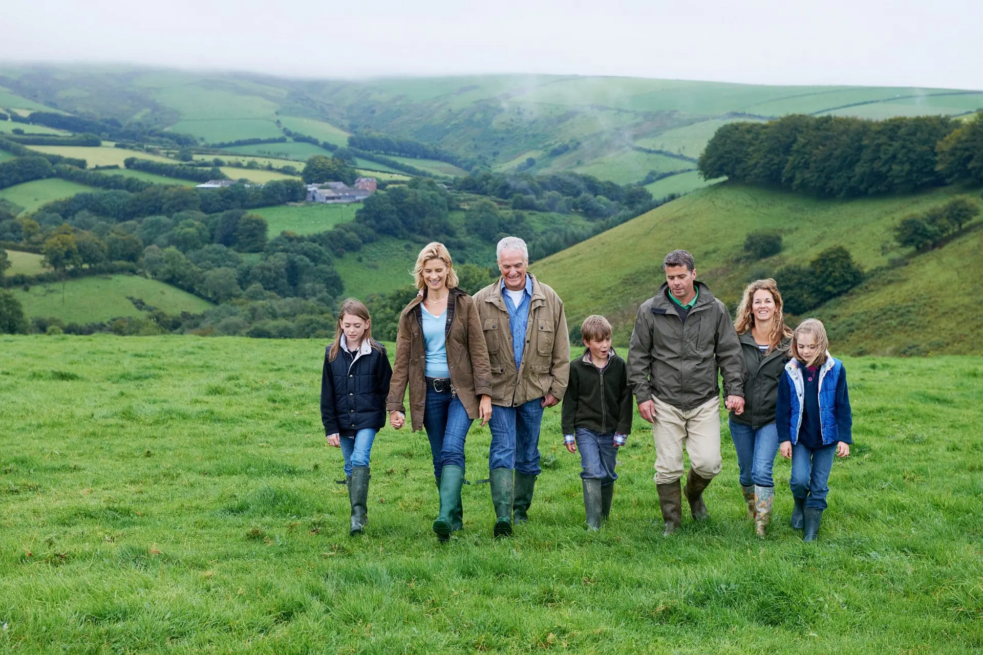 Locals walking through field