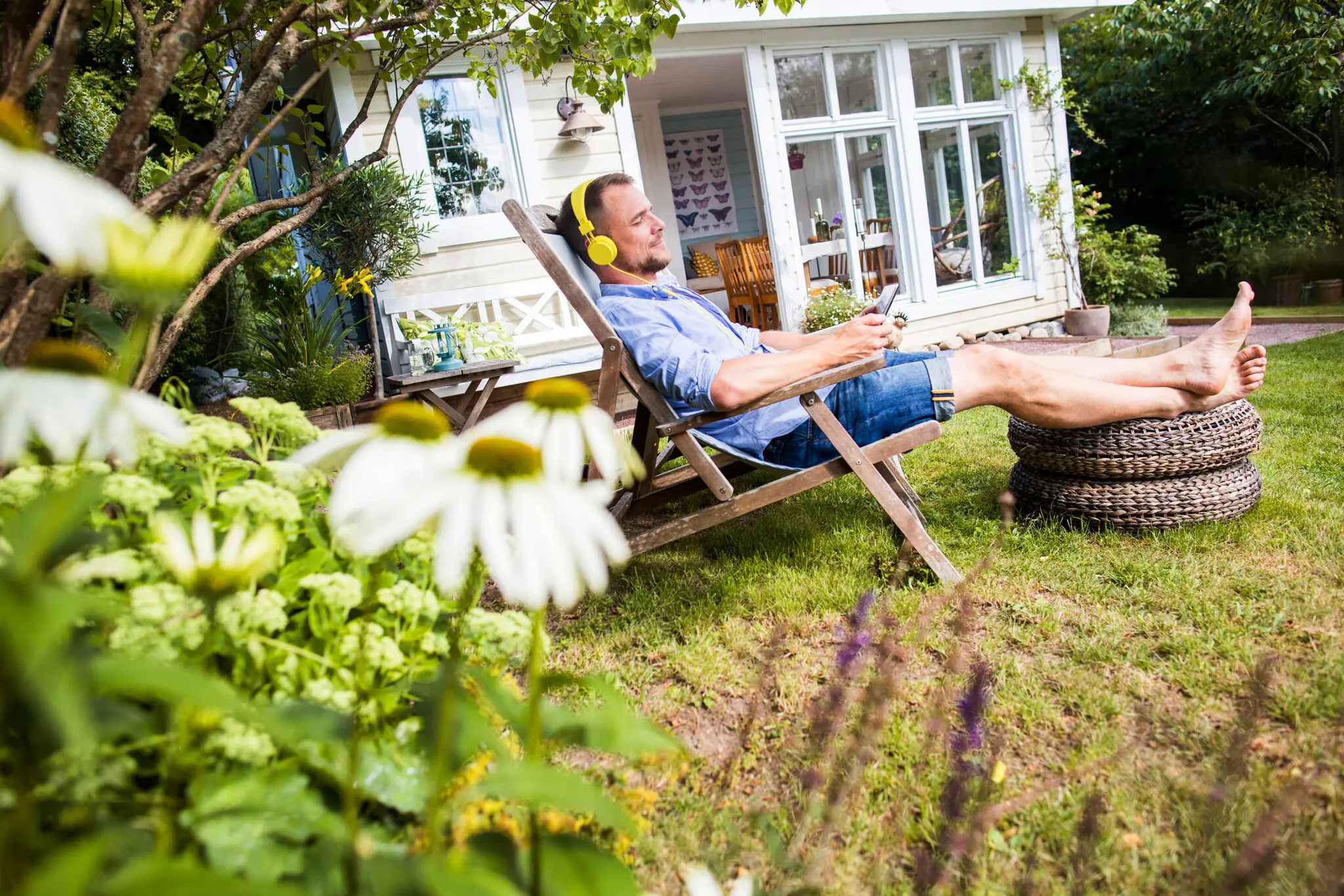 Holiday let owner relaxing while considering property management options