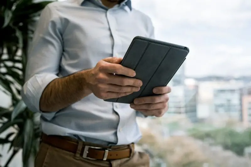 Man using the HolidayHost app on his tablet