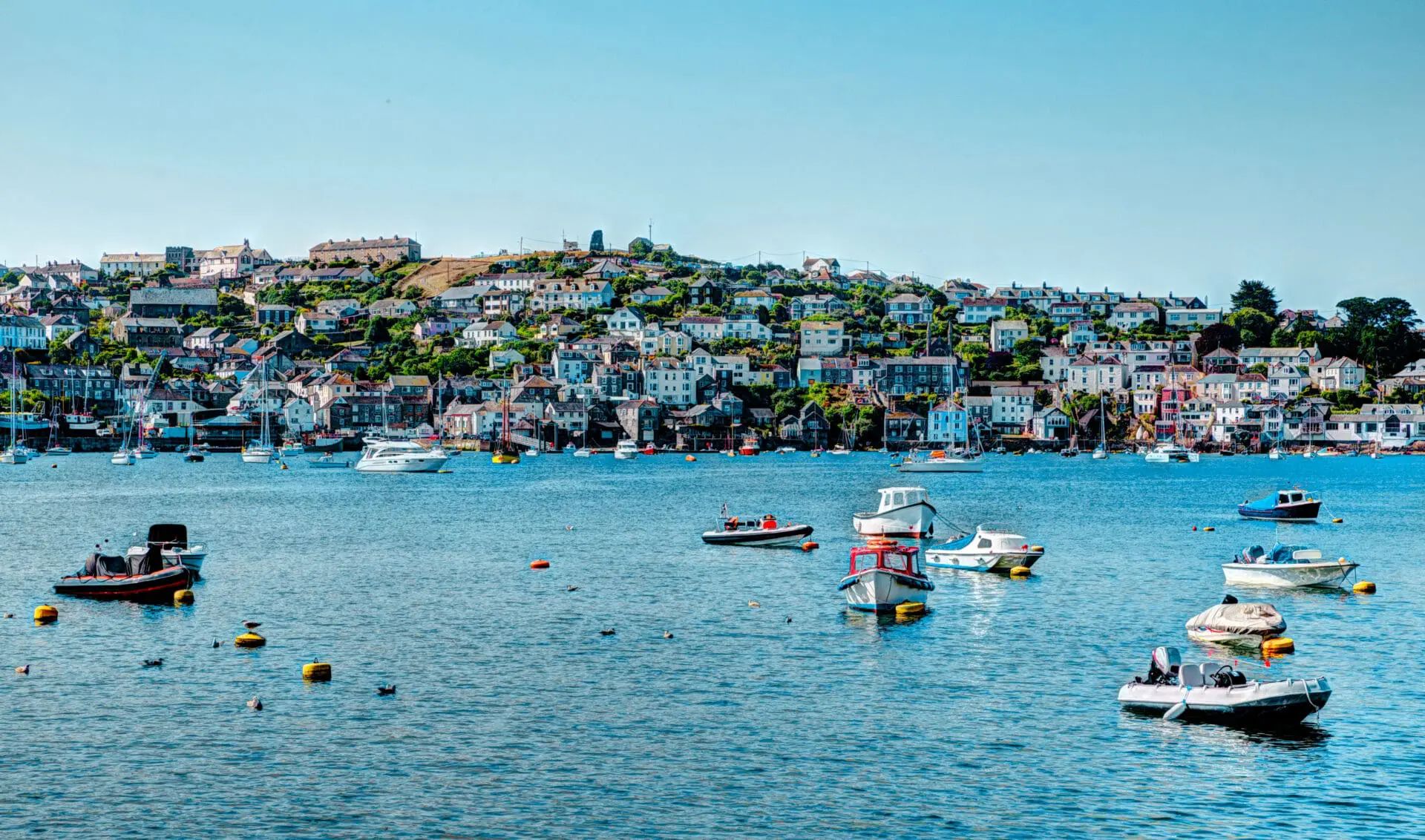 View of Fowey harbour and hillside town from the sea in Cornwall